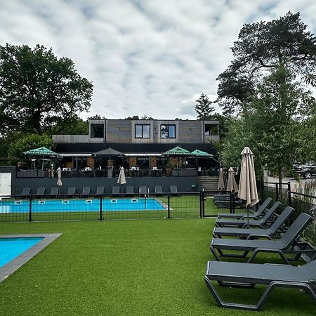 Sfeervolle blokhut op de Veluwe op recreatiepark Topparken in Beekbergen met vrije tuin en eigen parkeerplaats Buitenkant foto